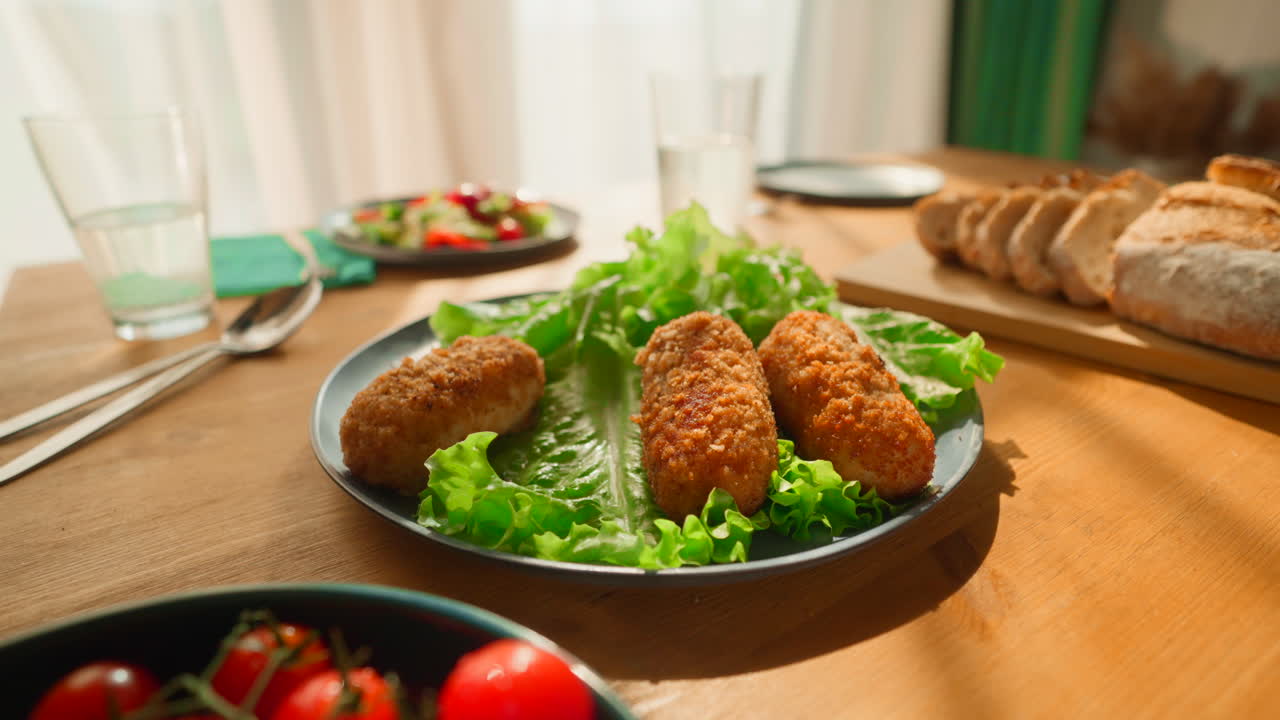 Delicious Breaded Cutlets with Salad and Bread