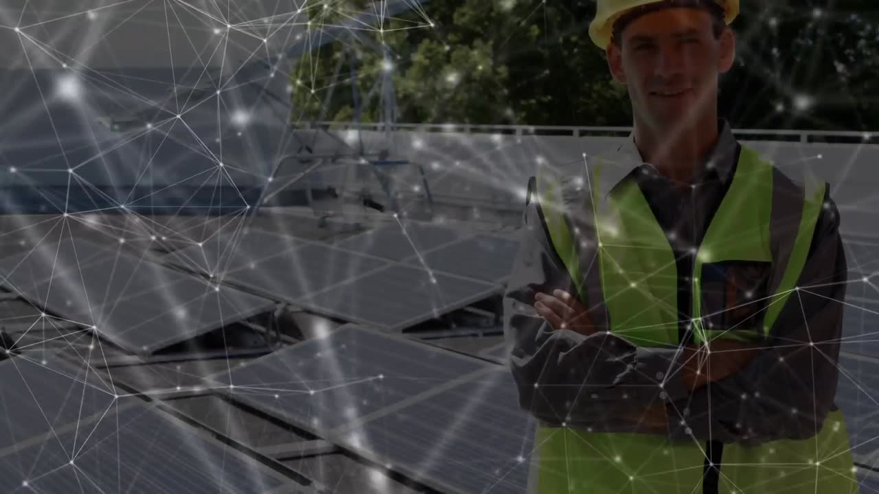 Animation of network of connections over solar panels and male engineer in background