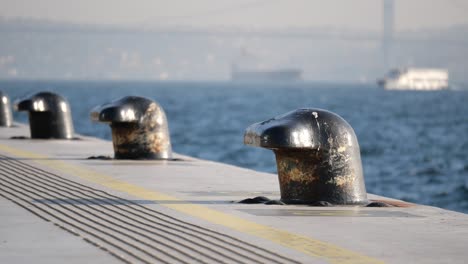Pier with mooring posts at a harbor