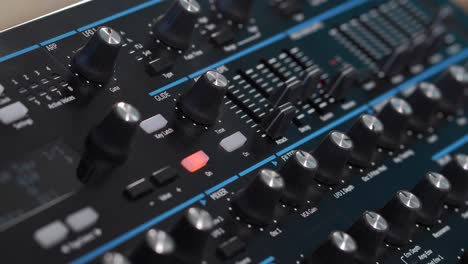 dive into the creative process with cinematic close-ups of studio equipment, including pianos, mixers, and electronic synthesizers