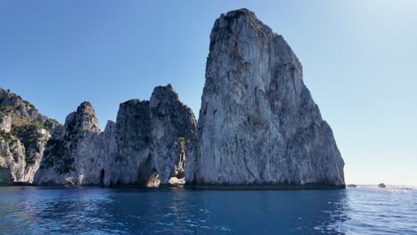 faraglioni at capri in naples italy. island landscape. tourism landmark. faraglioni at capri in naples italy. bay of naples skyline. cultural heritage coastal. paradise capri island.