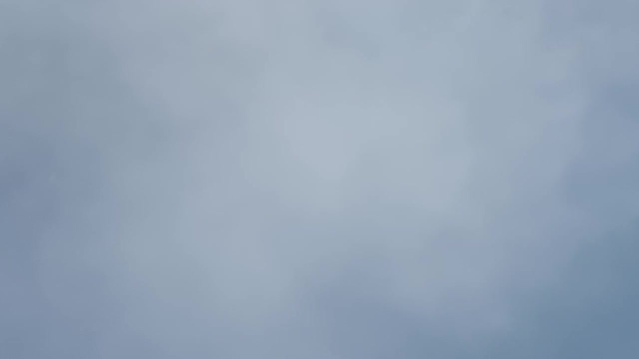 Steam in the air on a cold winter day against the sky background