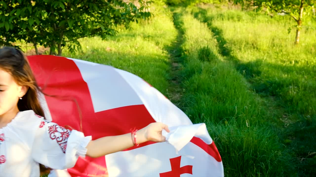 조지아 발을 들고 애국하는 아이, 선택적인 초점, 자연.