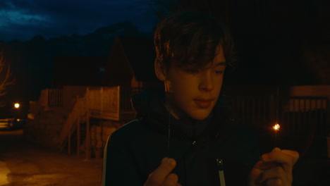 teenager with sparkler