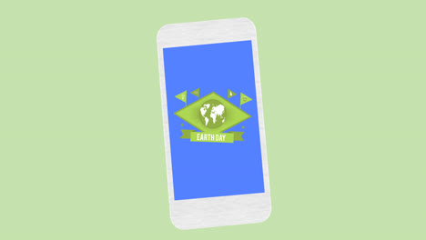 animation of earth day text and globe logo on smartphone screen, on green