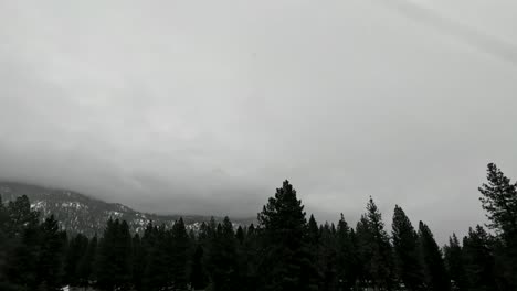 4k timelapse of winter snow clouds rolling over the high sierra nevada mountains