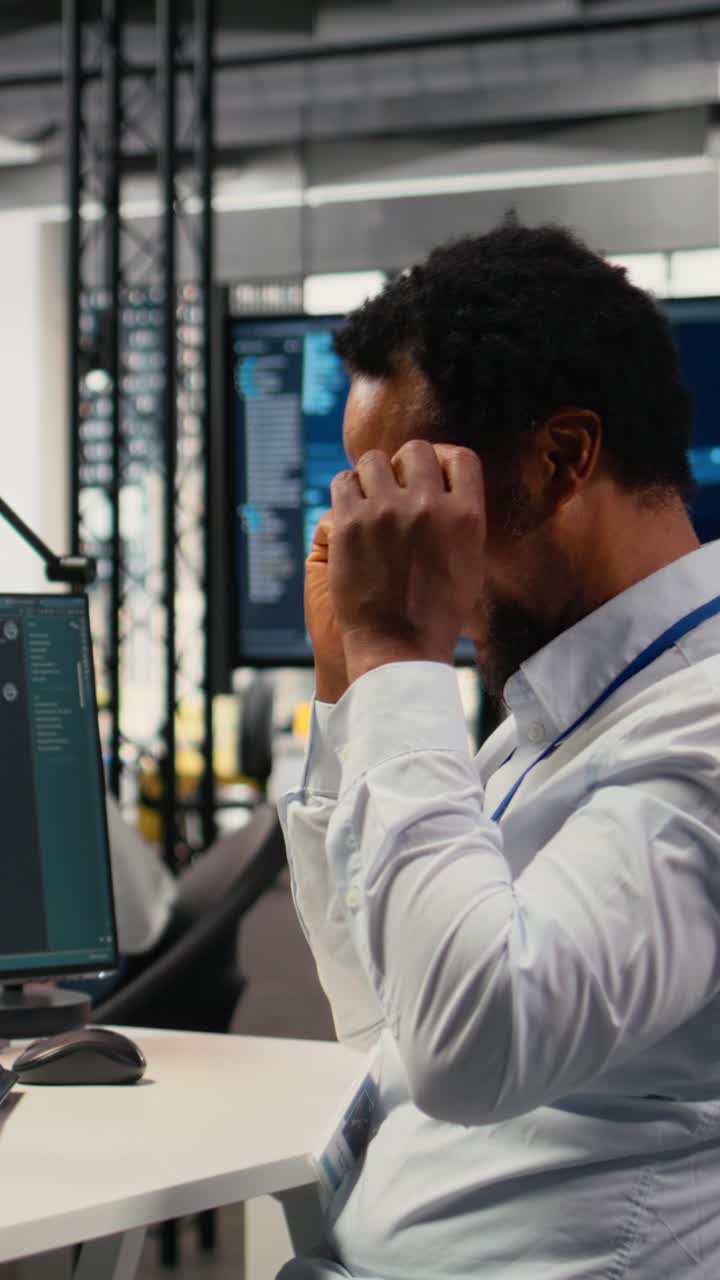 Vertical video Programmer in office using AI LLM chatbot to get help