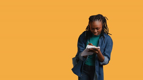 girl with bad eyesight squinting eyes, trying to read, studio background