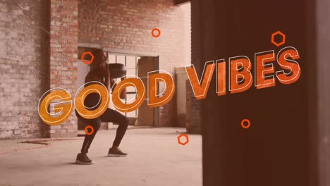 animation of good vibes text over mixed race man exercising with a ball