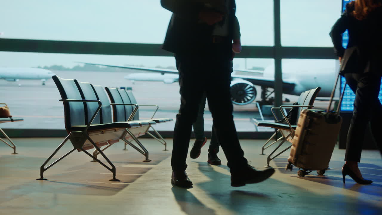 People waiting at airport departure lounge