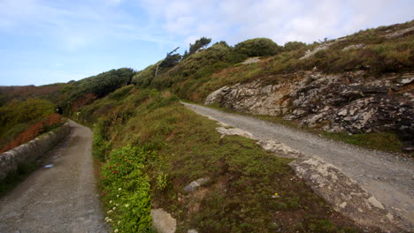 wide shot of two coastal roads at bessy's cove, the enys, cornwall