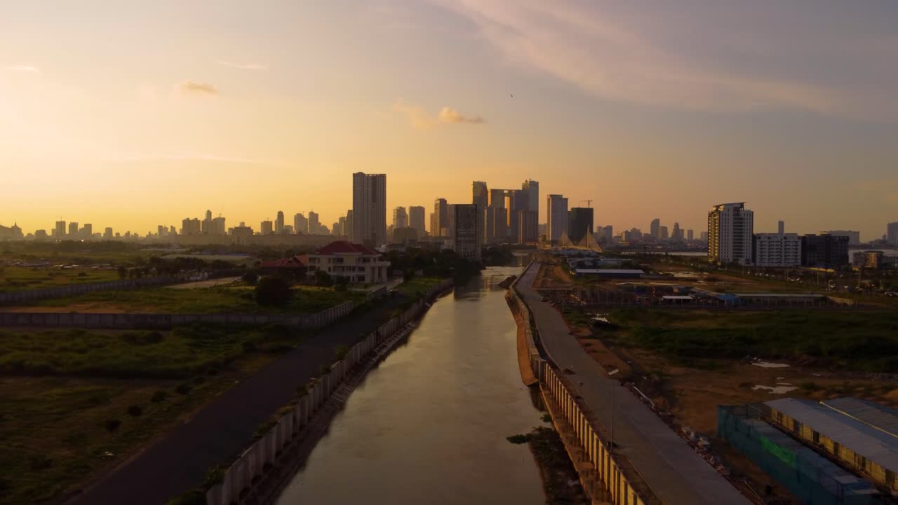 Phnom Penh Cambodia city skyline sunset sunrise golden hour aerial Mekong river