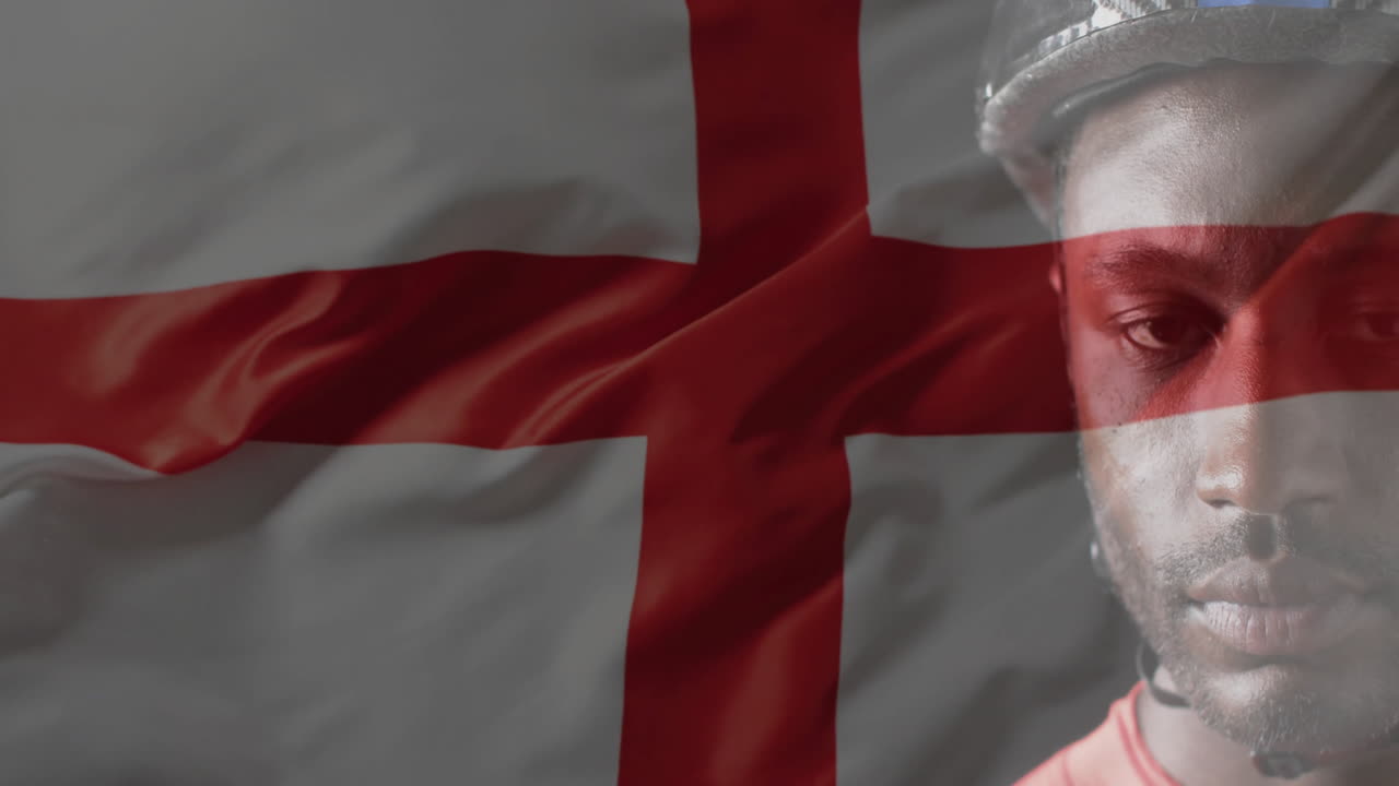 animación de la bandera de inglaterra sobre el atleta afroamericano