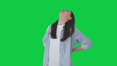 sick indian girl suffering back pain green screen