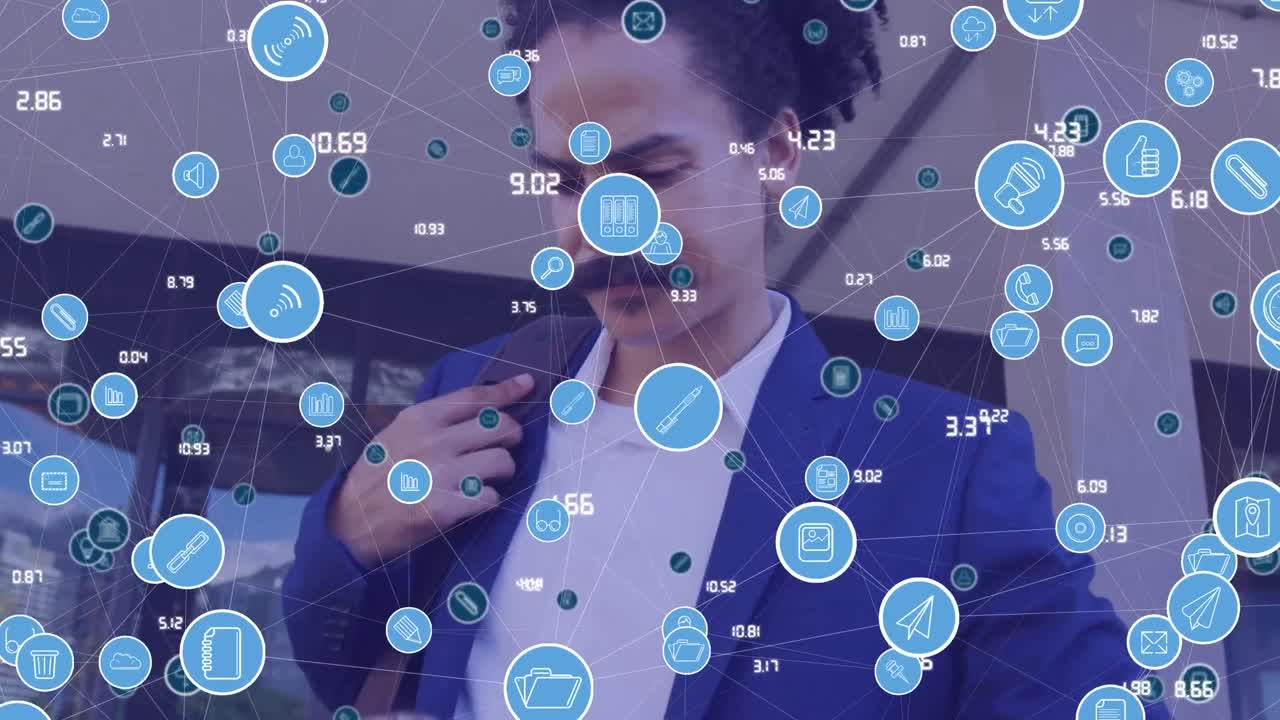 animación de iconos de los medios sobre un hombre de negocios biracial que usa una tableta