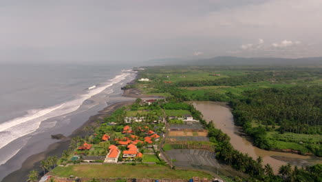 relaxation, adventure, cultural immersion on balinese beach. aerial