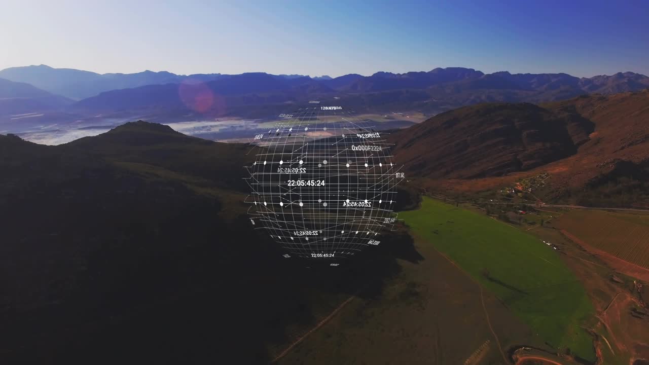 On approach holographic globe appearing over valley, rotating, scaling and adding data for mapping