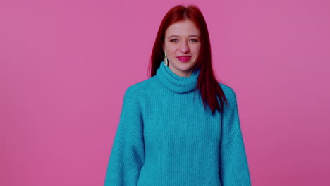 Smiling-redhead-happy-girl-blinking-eye,-looking-at-camera-with-toothy-smile,-winking-and-flirting