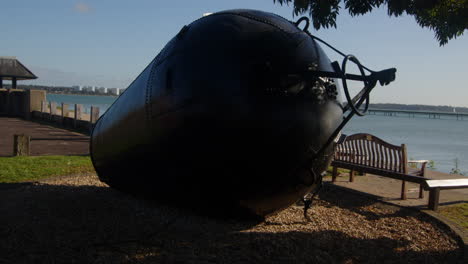 shot of a harbour buoy on land at hythe marina village