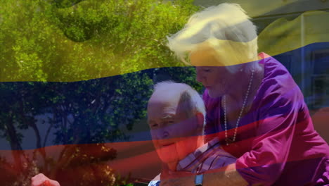 animación de la bandera de colombia sobre una pareja caucásica de alto nivel abrazándose