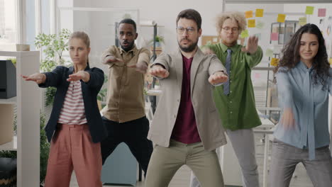 team dancing in the office