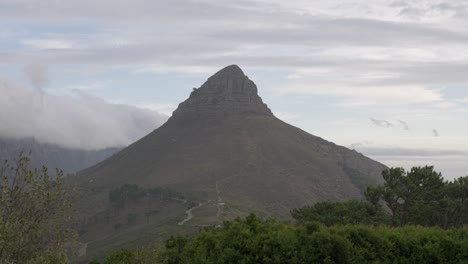 establishing shot of table top and lions head mountain in cape town south africa