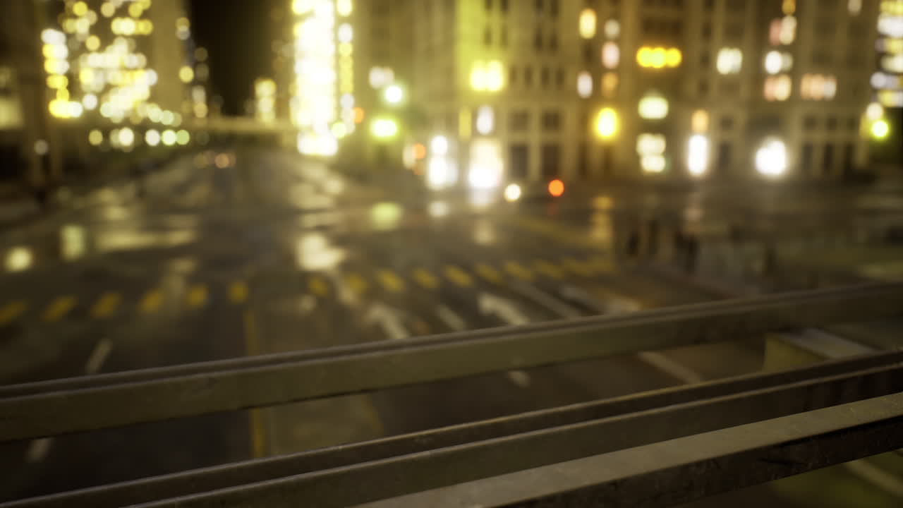 City street at night with illuminated buildings and wet pavement