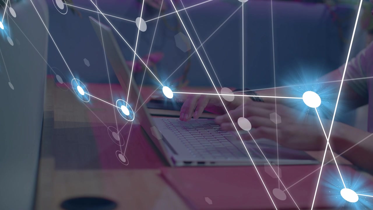 Man typing on laptop, initiating data network visuals showing flow, growing over keys and phone