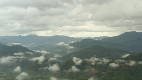 aerial view of cloudy sky in rainy season and beautiful mountains, 4k landscape footage background.