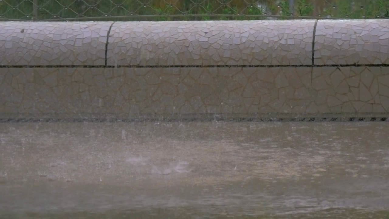 Pouring Rain Puddle Slow Motion