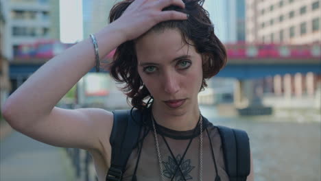 Outdoor-Fashion-Portrait-Of-Young-Alternative-Style-Woman-With-Tattoos-And-Piercing-At-Canary-Wharf-In-London-Docklands-Shot-In-Real-Time-1