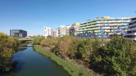 river le lez in montpellier with urban residential building drone view