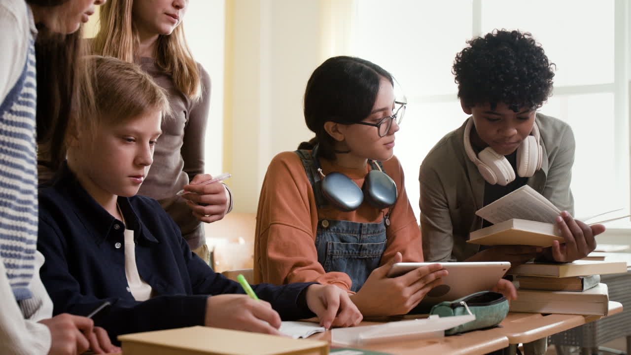 Group of students studying and collaborating in a classroom