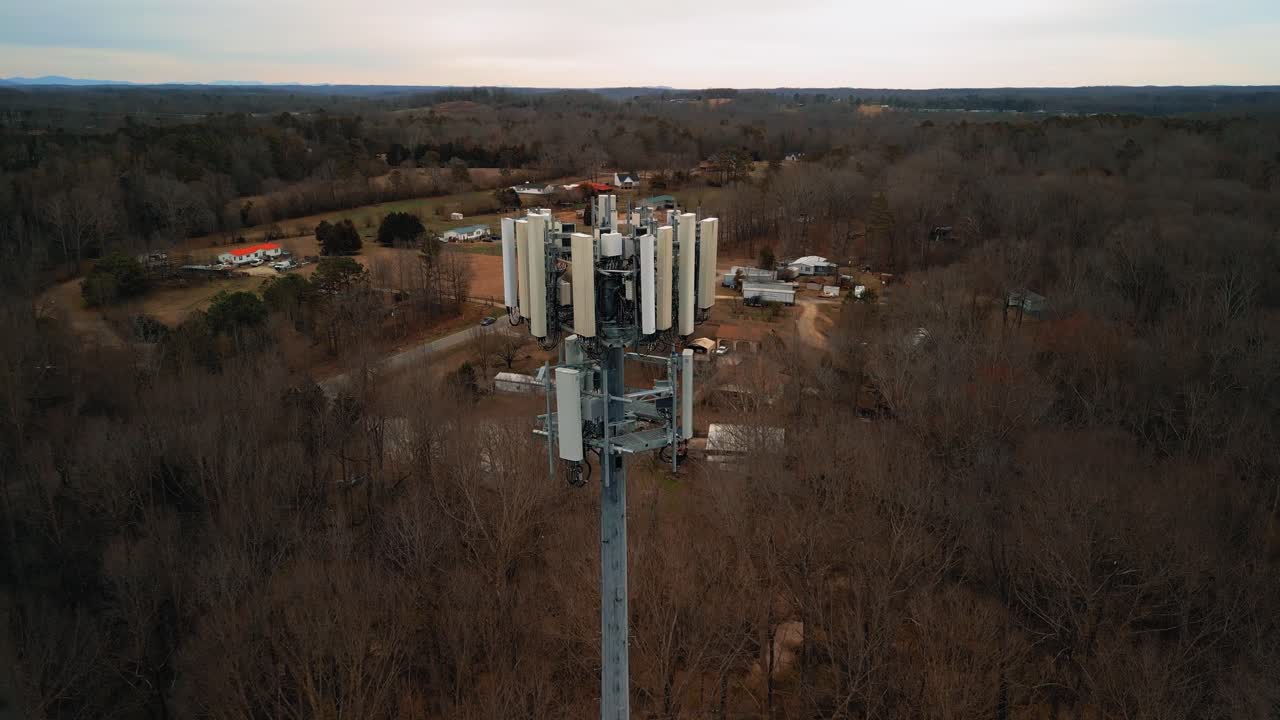 Aerial Shot Revealing Cell Phone Tower in Forest. 4K Drone