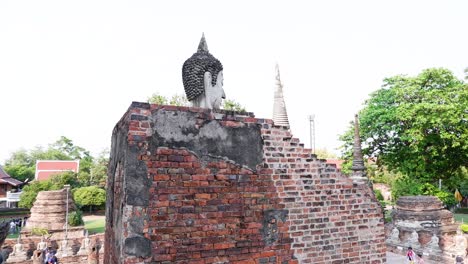 tourists explore historic pagoda temple in ayutthaya