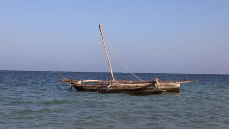 a traditional boat at diani beach - galu beach - kenya, africa