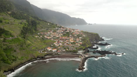 drone aerial footage of seixal beach and town on north coast of madeira, portugal