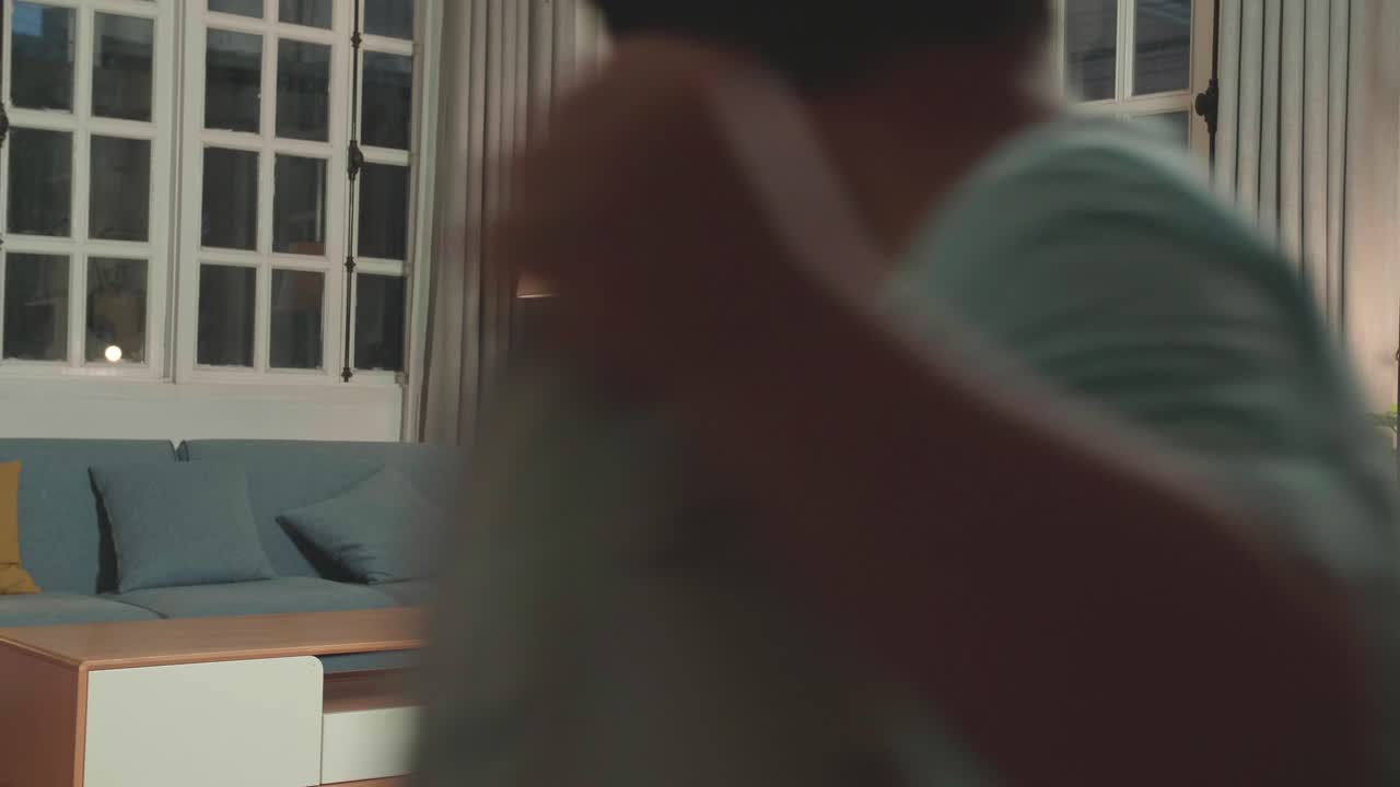 Asian Little Boy Shows Trick With Disappearing On Mobile Phone Camera While Recording On Smartphone Video Content For Social Networks In Cozy Room