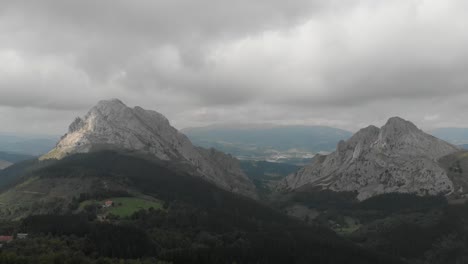 flying towards a valley between peaks of the cantabrian mountain range