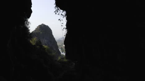 treasure cave rock climbing location with ropes attached to cliff