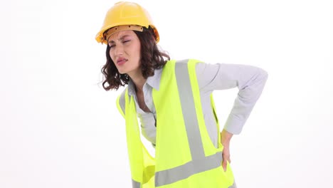 female construction worker suffering from back pain