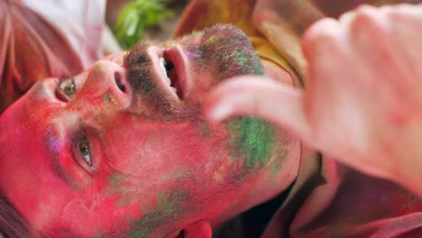 multi ethnic people celebrating the festival of colors holi in india