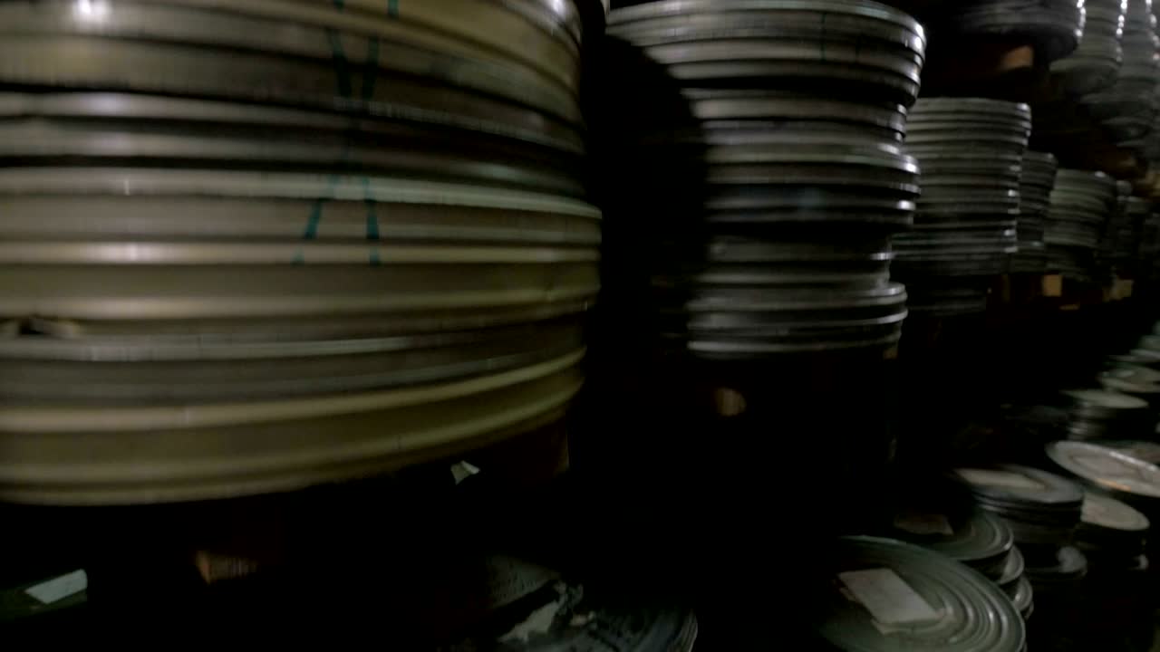 A great number of videotapes being stored in film archive.