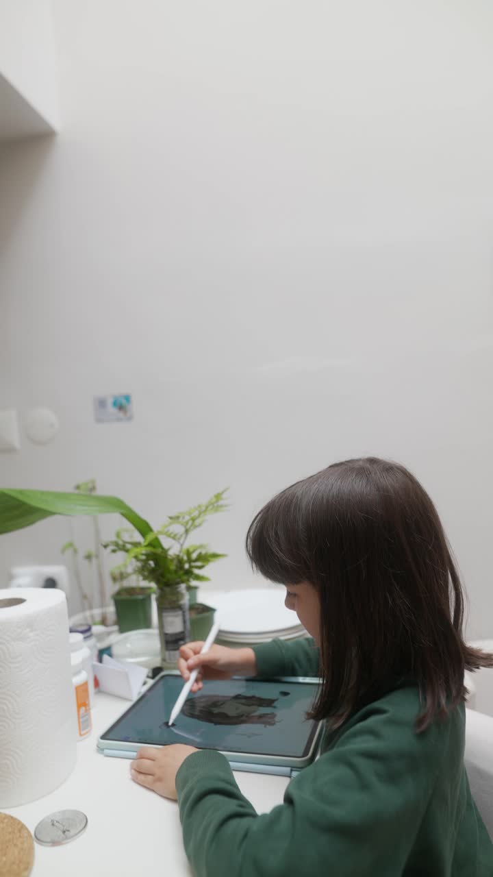 Girl Drawing on a Tablet