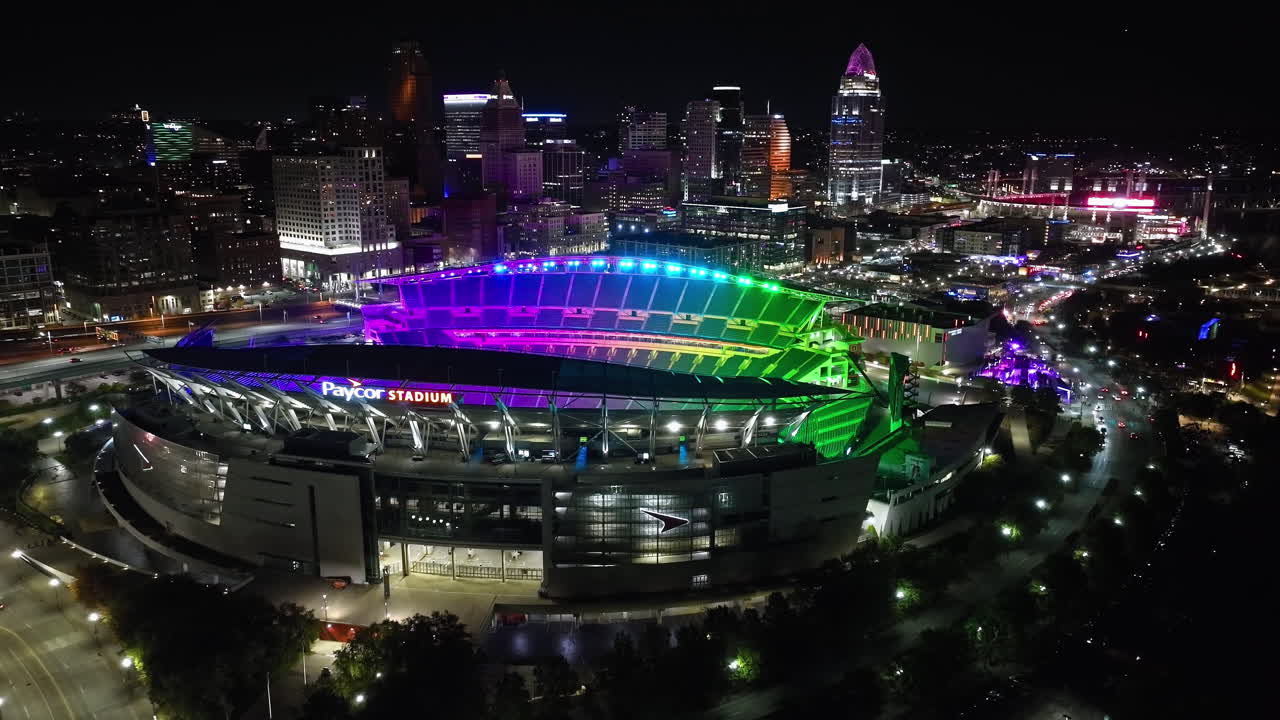 Aerial view away from the Cincinnati Paycor Stadium illuminated in Blink colors