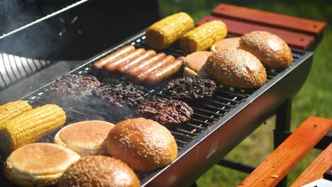 Mixed-american-barbecue-food-on-hot-grill