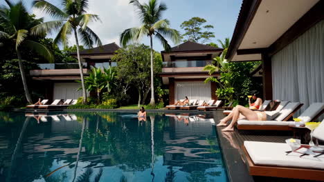 luxury resort with swimming pool and relaxing people