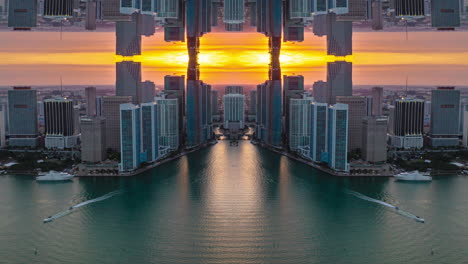 Symmetrical-composition-of-high-rise-building-on-waterfront-in-sunset-time.-Abstract-computer-effect-digital-composed-footage.