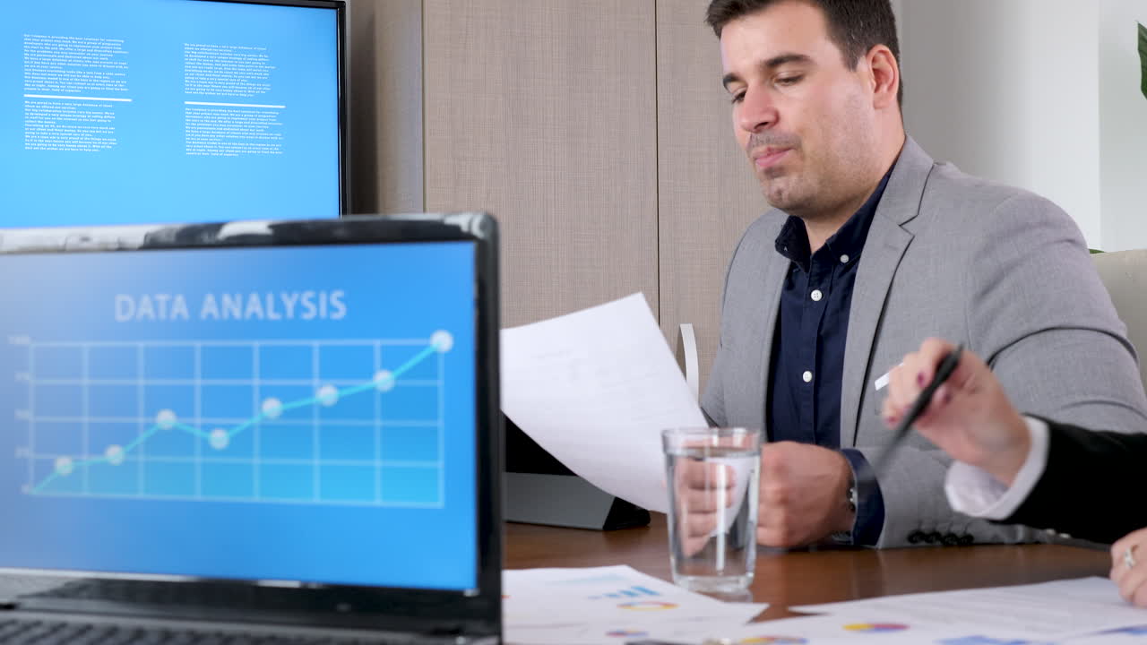 Business meeting with data analysis presentation