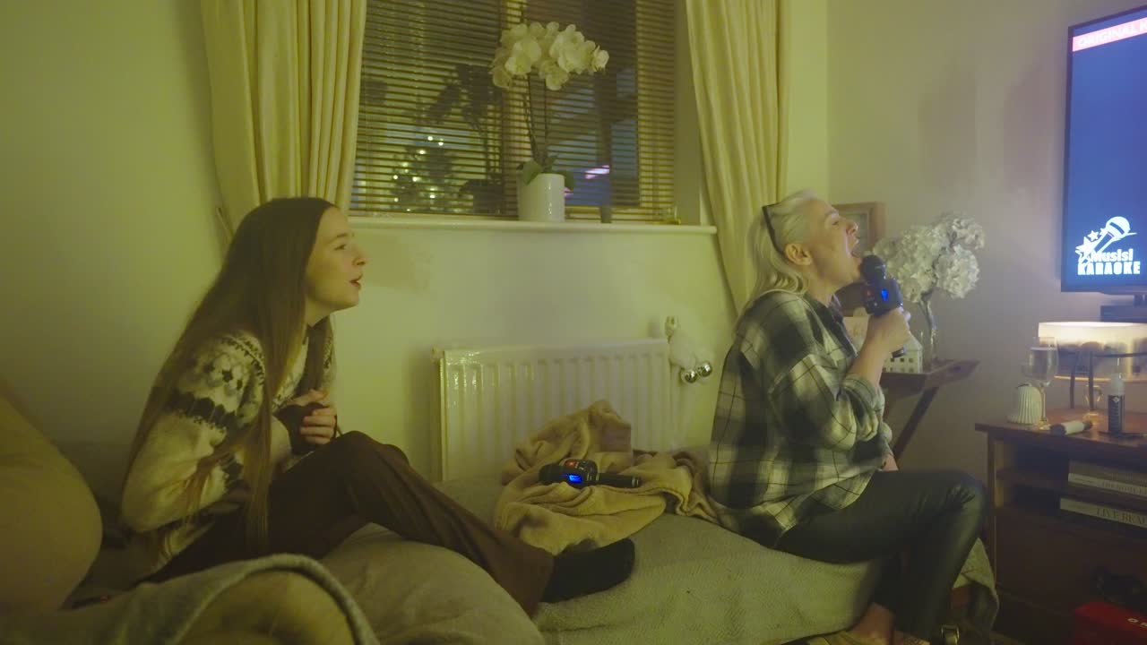 Mother, daughter, karaoke singing, family fun memories